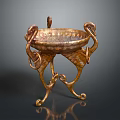 Golden Metallic Decorative Bowl With Curved Stands And Intricate Artistic Design