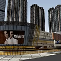 Modern Shopping Mall Exterior With High Rise Buildings Large Billboard Featuring ROBELI Brand Retail Spaces