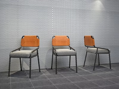 Leisure Chairs Featuring Orange Backrests Gray Seats And Black Metal Legs Against Perforated White Wall 3d model