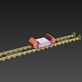 Industrial Equipment With Orange And White Components On Black Track System