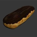 Freshly Baked Chocolate Eclair With Cream Filling Golden Pastry And Smooth Glaze