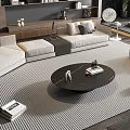 Modern L Shaped Sofa And Round Coffee Table In Living Room With Striped Rug And Decorative Items