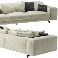 Modern Beige Upholstered Sectional Sofa With Dark Accent Pillows And Metal Legs