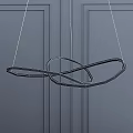 Modern Golden Chandelier with Intertwined Rings and Illuminated LED Light in Minimalist Gray Background Design