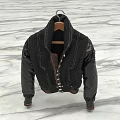 Stylish Black Jacket With High Collar Stitched Details Contrasting Fabric Sleeves On Hanger Marble Floor