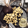 Modern Black White Dinnerware Set For Table Setting With Yellow Fruits Green Plants And Cutlery