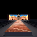 Large Screens Show Desert Landscape With Teepee Structure Cacti Plants And Bench Seating