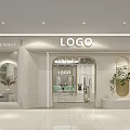 Modern Stylish Clothing Store With Arched Entrance Glass Door Green Plants And Round Mirror