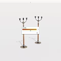 Pair Of Decorative Wooden Candle Holders With Metal Arms And Ornate Base