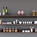 Organized Kitchen Utensils Display On Wooden Shelves With Spice Jars Cups And Bowls