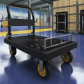 Black Platform Cart With Metal Handle And Yellow Hub Wheels In Warehouse