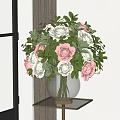 Elegant Transparent Glass Vase With White Pink Roses Ranunculus Green Leaves On Gold Metal Table