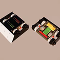 Two Electronic Modules With Internal Green Yellow Red Components And Black White Casing 3d model