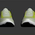 Lightweight White Sports Shoes With Yellow Accents Black Logo And Modern Design
