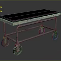 Vintage Metal Frame Furniture Cart With Black Top Surface And Rolling Wheels