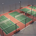 Two Tennis Players Playing On Nighttime Court With Green Red Surface And Lights