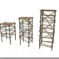 Three Natural Branch Constructed Architectural Towers With Crossed Frame Structures And Different Heights