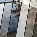 Construction Elements Featuring High Gloss Marble Floor And Glass Partitions