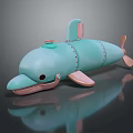 Playful Blue Toy Dolphin With Pink Fins Tail Round Eye And Shiny Surface