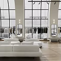 Bright Modern High End Clothing Store With Arched Windows Wood Flooring And Cozy Lounge Area