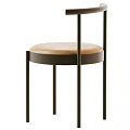 Modern Dining Chair With Round Beige Padded Seat And Black Metal Legs