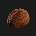 Three Whole Walnuts With Natural Shell Texture On Black Background