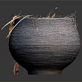 Wilted Dried Grass Plant in Textured Clay Pot on Neutral Gray Background