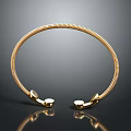 Golden Circular Electronic Appliance Headband With Coiled Texture On Black Background