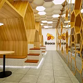 Bee Coffee Café Interior With Yellow Wall Honeycomb Pattern Marble Countertop And Beeco Logo