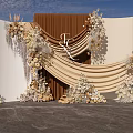 Wedding Photo Check In Spot With Beige Brown Backdrop And Floral Decorations
