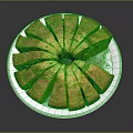 Golden Sliced Round Cake Served On White Plate With Dark Background