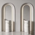 Two Cylindrical Marble Washbasins in Arched Doorframes with Sleek Metal Faucets