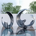 Modern Abstract Silver Sculptures on Smooth Surface with Green Trees and White Wall Background