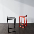 Modern Black And Red Bar Stools With Slim Frame On Wooden Floor And White Wall