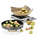 Fresh Figs and Pears Displayed in Woven Basket and Marble Bowl with Stacked Books