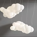 Two Decorative Cloud Shaped White Chandeliers Hanging Against Gray Background 3d model