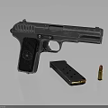 Vintage Silver Metallic Pistol with Magazine and Single Bullet on Black Surface