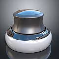 Sleek Metallic Device With Silver Top White Base And Smooth Reflective Surface Design