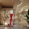 Modern Artistic Café Interior Featuring Green Plants Red Sculpture Curved Walls And Terrazzo Floor