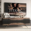 Modern Wooden TV Stand With Metal Accents And Decorative Items Below Large Screen TV
