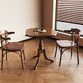 Hexagonal Wooden Table With Two Armchairs In Room With Wooden Floor And Window Blinds