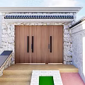 Wooden Double Entrance Door With Black Handles Stone Walls Tile Roof And Colored Steps