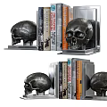 Stylish Books Arranged With Decorative Skull Bookends On Home Shelf Decor