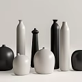 Elegant Black and White Ceramic Vases with Diverse Shapes and Modern Design