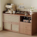 Wooden Sideboard Featuring Rattan Doors and Coffee Machine with Tulip Vase on Top