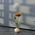 Modern Floral Art Installation With Dandelion Sunflower In Egg Shaped Vase On Gray Background