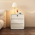 Modern White Bedside Table With Drawer Table Lamp And Figurines In Bedroom With Wooden Floor