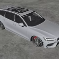 Dark Blue Volvo Estate Car With Sleek Design And Black Alloy Wheels