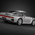Silver Porsche Classic Sports Car With Sleek Body Design And Brown Leather Interior