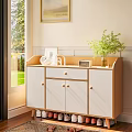 White And Wooden Shoe Cabinet With Drawers And Doors Indoor By Window With Potted Plant